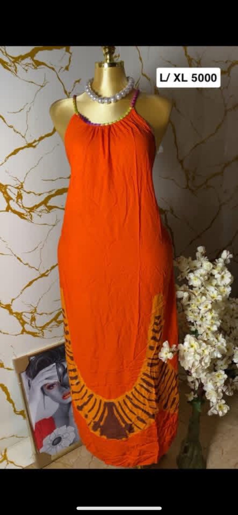 Magnifique robe longue orange – Chic et lumineuse