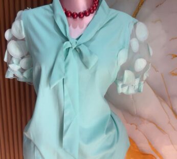 Magnifique chemisier turquoise – Chic et lumineux