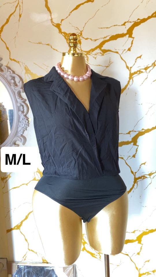 Magnifique chemisier noir sans manches – Chic et moderne