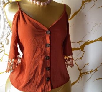 Magnifique chemisier orange – Chic et lumineux